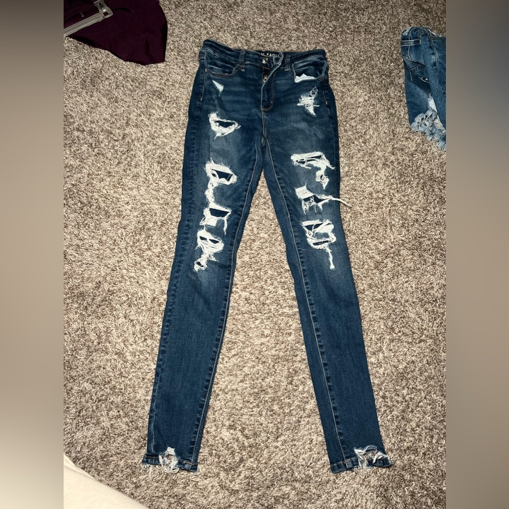 Medium/dark wash American eagle skinny Jean distressed size 8,long